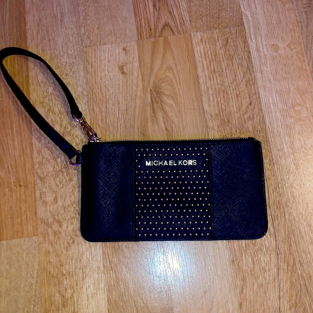 USED ONCE!! BLACK AND GOLD WRISTLET.